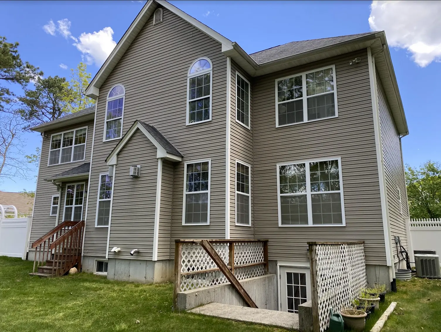 Soft washing a Long Island home exterior